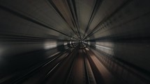 Fast hyperlapse, view of moving train in subway tunnel from forward window. Timelapse riding metro in modern city. Long footage of underground carriage following its route. High quality 4k footage