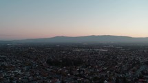 aerial view over suburbs in the evening 