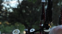 Close up of bagpipes at an outdoor event