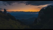 Sunrise in mountains nature landscape with fast clouds Time-lapse
