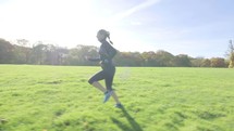 Female caucasian woman running cross country
