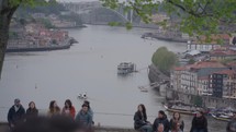 Porto, Portugal - The view of Porto's old town, the Douro River, and the Luís I Bridge as seen from the scenic spot Miradouro da Ribeira