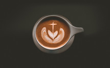cup of coffee with cross and heart shape 