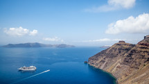 sea cliffs and cruise ship in Santorini 