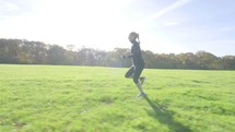 Female caucasian woman running cross country
