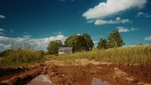 Farm land in summer with white clouds in the sky