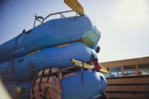 whitewater rafts stacked