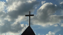 Funeral cross and clouds - timelapse