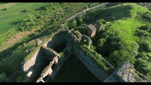 aerial view over castle ruins 