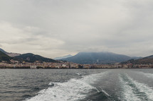 view of coastal cities in Italy and boat trail 