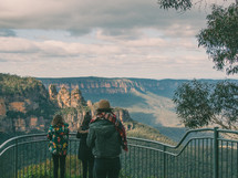 people at a viewing site overlooking the Blue Mountains 