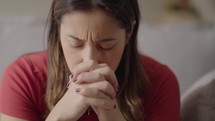 Religious adult woman praying
