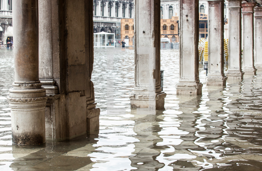 View of the arcades of the Piazza San Marco with high water in Venice, Italy.