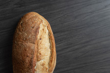 bread loaf on a black background 