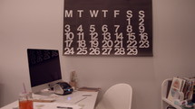 calendar over a desk 