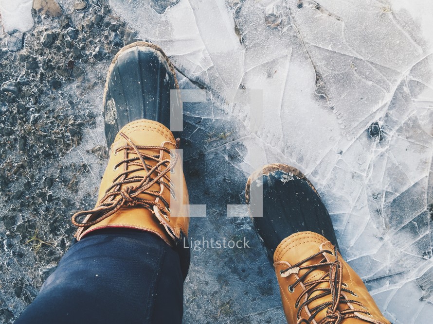 boots standing on ice 