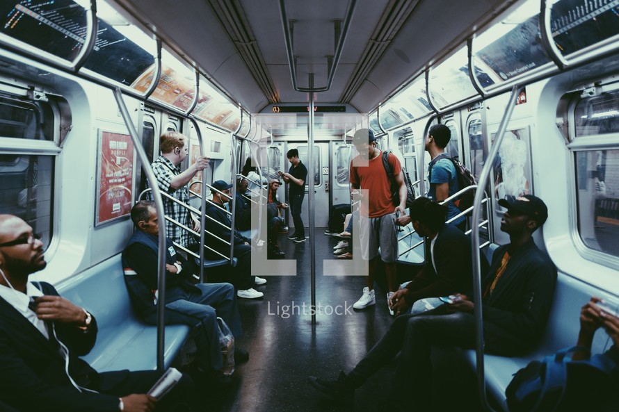 passengers on a subway train 