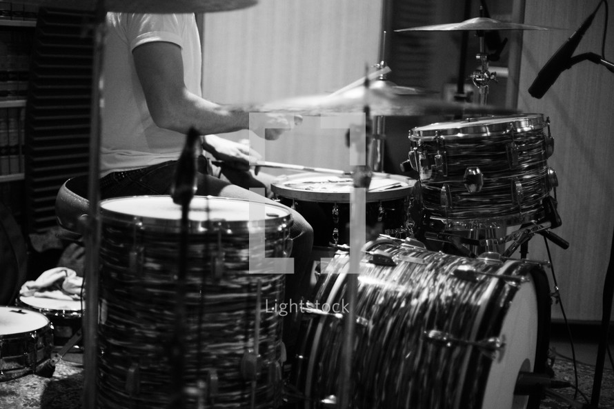 man playing a drum set 