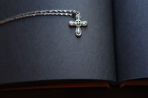 A necklace with a cross pendant.