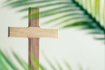 Wooden cross and palm branch