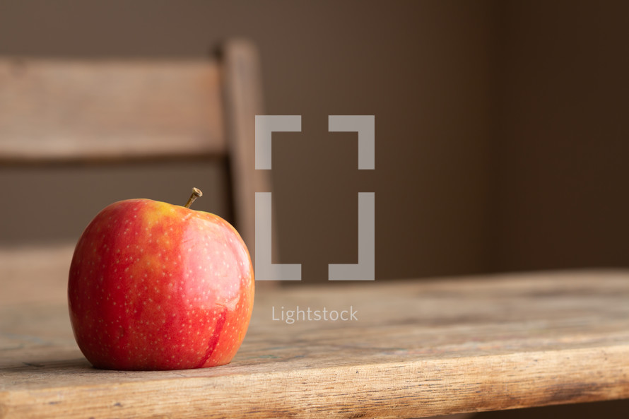 apple on a desk 