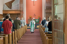 a priest giving a sermon 