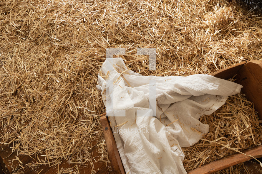 empty manger in hay 