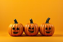 Halloween pumpkins on orange background. 3d render illustration.
