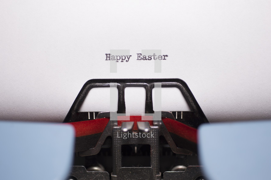 words Happy Easter typed on a typewriter 