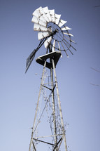 windmill against a blue sky