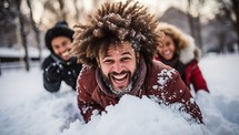 Group of friends having fun in the snow.