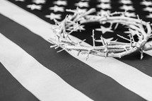 Crown of thorns on an American flag.