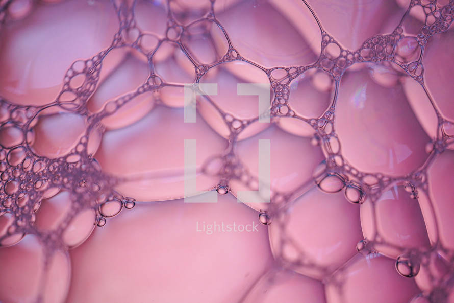 soap bubbles, pink abstract background