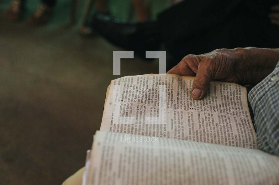 elderly woman reading a Bible in Nicaragua 