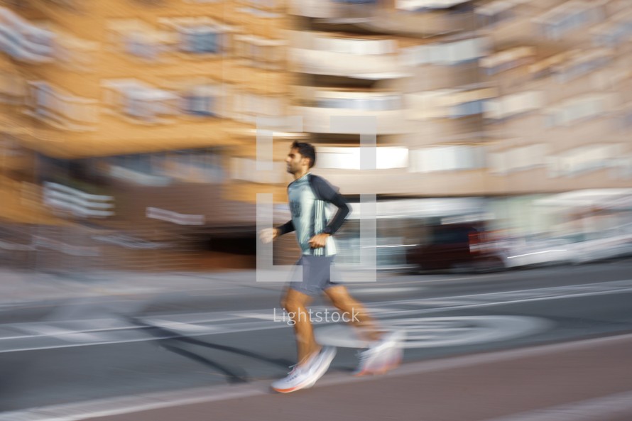 athlete running on the street