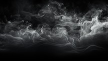 Abstract smoke moves on a black background. 