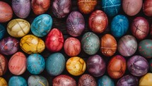 Colorful Easter eggs with intricate patterns and designs. Vibrant dyed eggs for spring holiday celebration