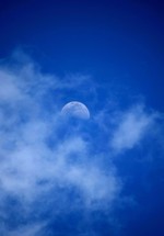 moon, clouds and blue sky 