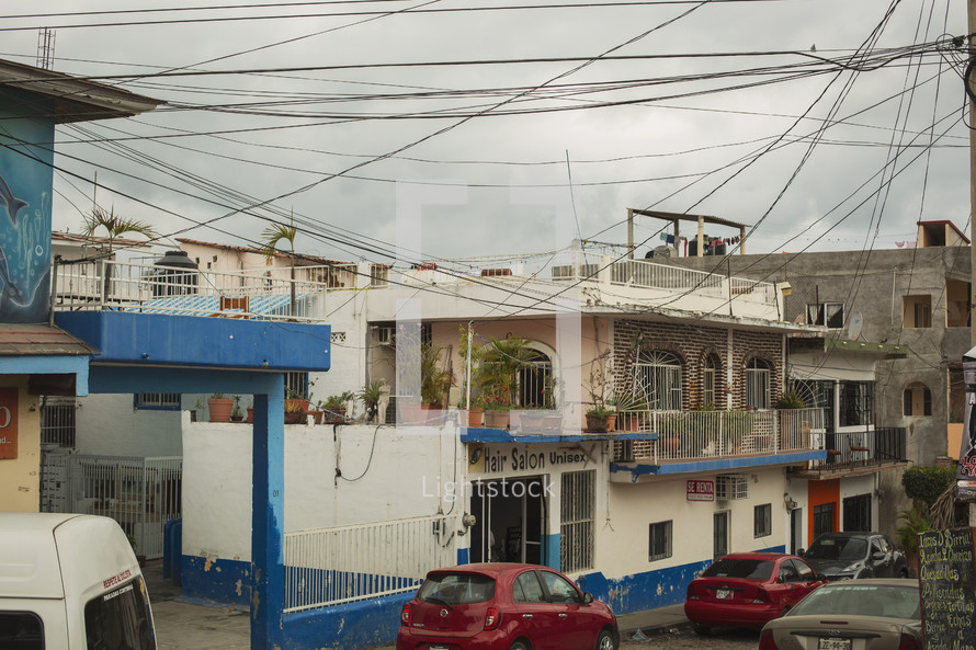 overhead wires and homes in small town in mexico