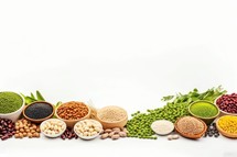 Legumes, peas, soybeans, beans, lentils, chickpeas and barley on white background