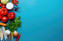 Fresh vegetables on a blue wooden background. Top view with copy space
