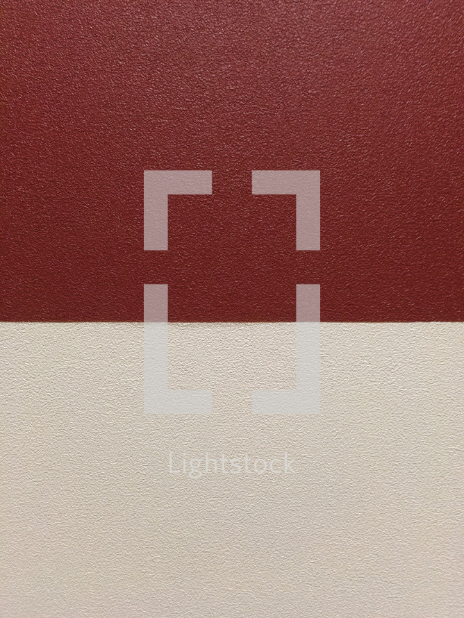Color contrast on a red and cream colored wall
