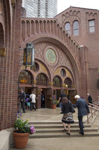 people entering a church 