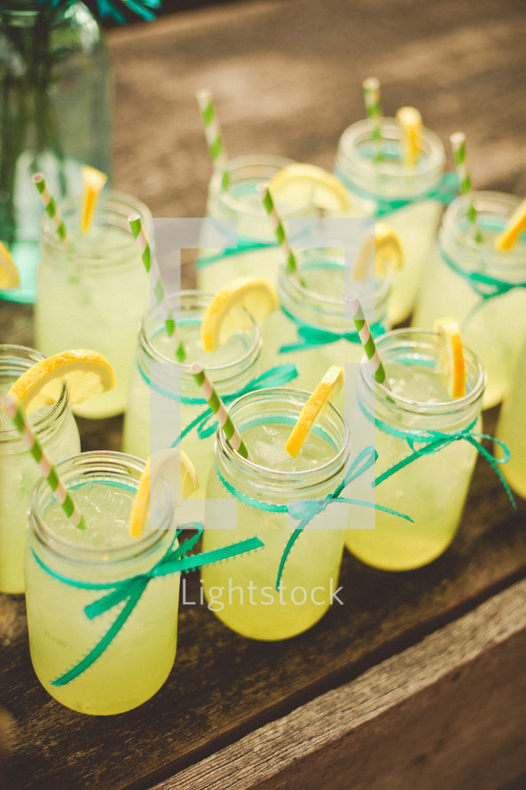 lemonade in glasses with straws 