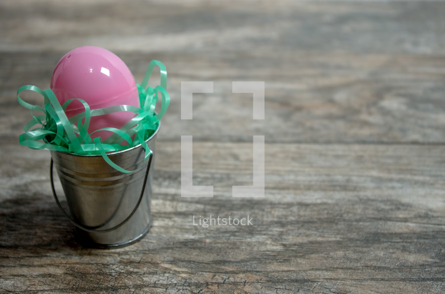 Easter egg in a metal bucket 
