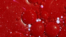 Top view abstract of blood red bubbles or paint. Inks, spheres, oil. Colorful shapes. Detailed background, beautiful design, balloons texture. High quality photo