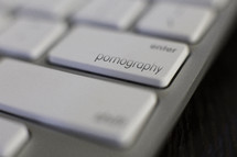 pornography button on a keyboard 