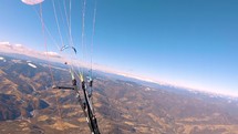 Beauty of free flight paragliding high above mountains nature in sunny spring adrenaline adventure freedom
