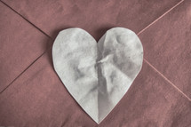 Valentine envelope with a white heart
