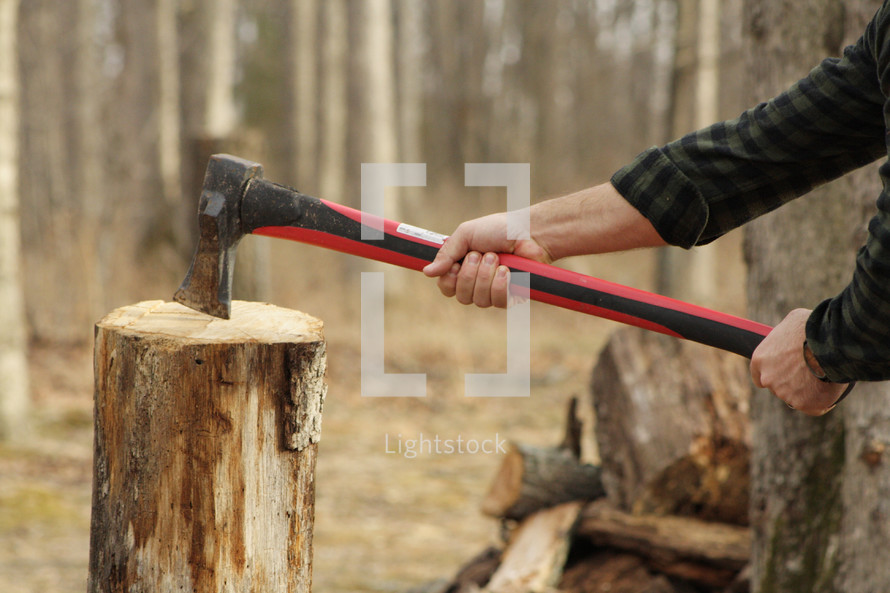 chopping wood with an ax 